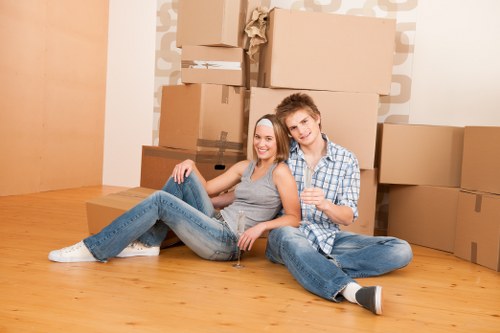 Office removals planning in Brentpark with desks and boxes