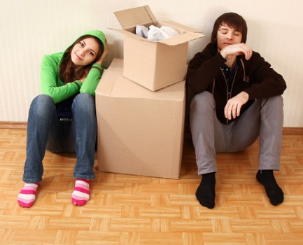 Packed boxes and furniture handling during a Brentpark house move
