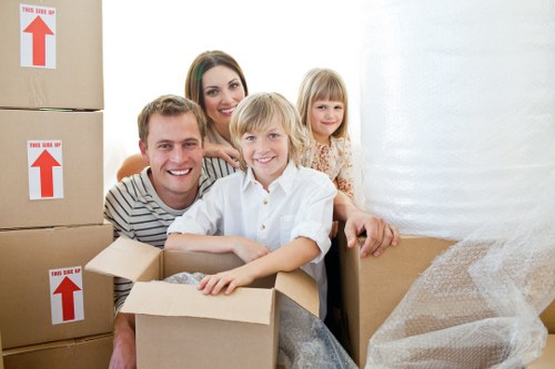 Unpacking boxes and setting up rooms in a Brentpark house