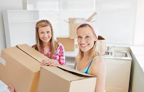 Packing and moving checklist beside a removal van in Brentpark