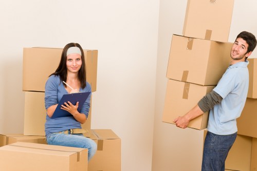 Packed office equipment and furniture prepared for relocation