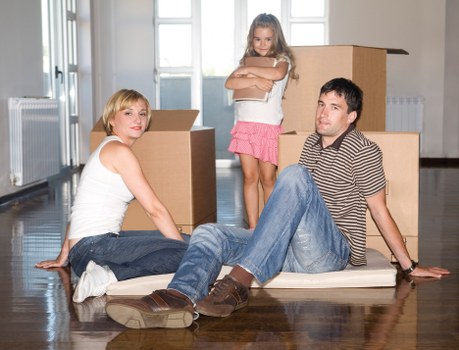 Furniture being loaded carefully into a removals van
