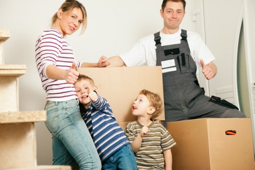 Local moving crew loading furniture into a truck in Brentpark